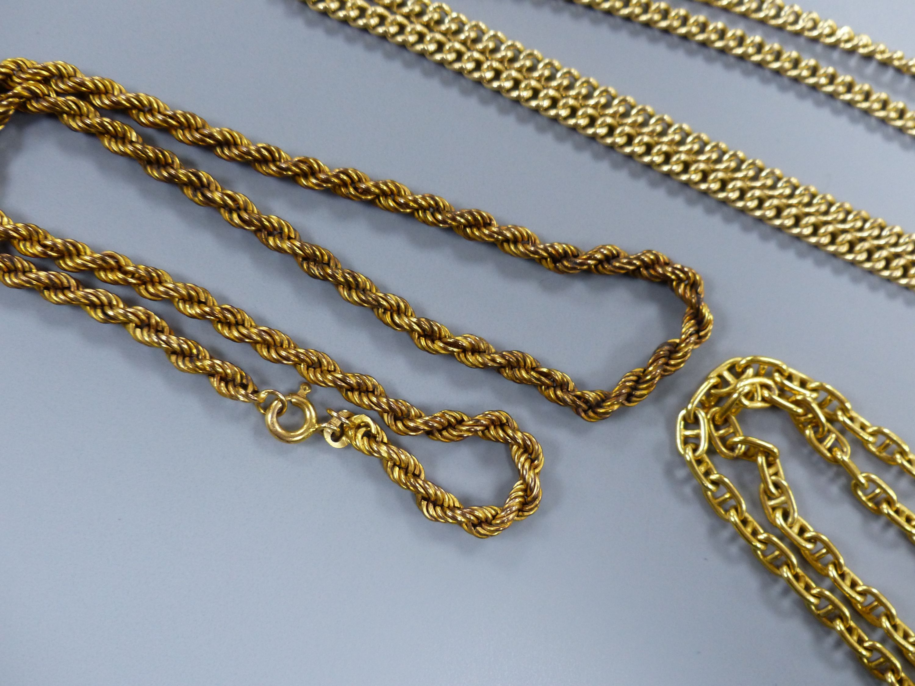 Three assorted modern 9ct gold necklace chains, including ropetwist, longest 50cm,